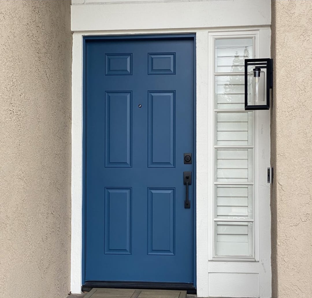 Steel blue six-panel front door repaint