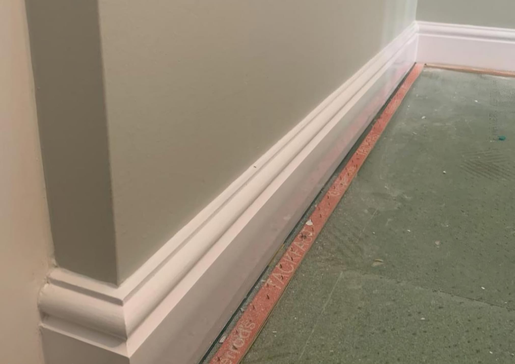Freshly painted skirting board detail