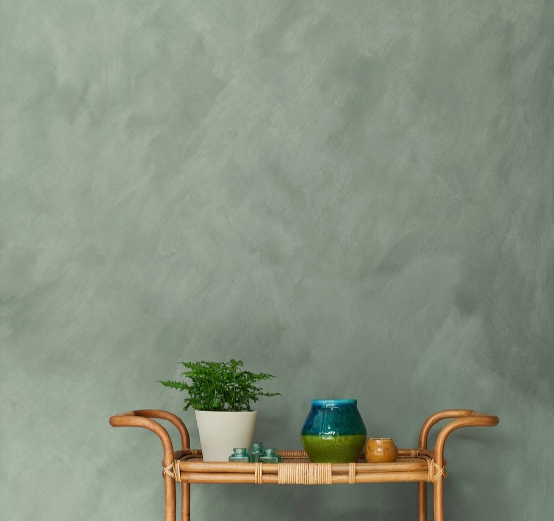 Sage lime-plaster wall finish